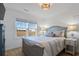 Comfortable bedroom with a queen-size bed and water views at 147 Anglers Dr., Murrells Inlet, SC 29576