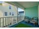 Upstairs deck with wicker chairs and side table at 147 Anglers Dr., Murrells Inlet, SC 29576