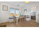 Small dining area with built-in bench seating and marsh views at 147 Anglers Dr., Murrells Inlet, SC 29576
