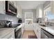 Clean and bright kitchen with stainless steel appliances at 147 Anglers Dr., Murrells Inlet, SC 29576