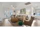 Coastal-styled living room with comfy seating and access to balcony at 147 Anglers Dr., Murrells Inlet, SC 29576