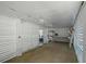 White storage room with slatted walls, workbench, and ladder at 147 Anglers Dr., Murrells Inlet, SC 29576