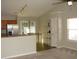 Kitchen with breakfast bar and view into living room at 148 Junco Circle, Longs, SC 29568