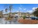 Exterior view of unit 5914, a condo building with ample parking at 1551 Spinnaker Dr. # 5914, North Myrtle Beach, SC 29582