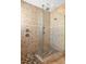 Large walk-in shower with tile surround and multiple shower heads at 1945 La Playa Dr., Myrtle Beach, SC 29588