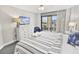 King bedroom with dresser, TV, and ocean view at 201 74Th Ave. N # 701, Myrtle Beach, SC 29572