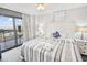 King bedroom with ocean view and balcony access at 201 74Th Ave. N # 701, Myrtle Beach, SC 29572