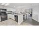 Clean, well-equipped kitchen with granite counters and white cabinets at 201 74Th Ave. N # 701, Myrtle Beach, SC 29572