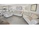 Spacious living room with comfortable seating and partial kitchen view at 201 74Th Ave. N # 701, Myrtle Beach, SC 29572