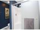 Bathroom with shower, gray towel, and decorative wall art at 265 Encore Circle, Myrtle Beach, SC 29579