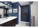 Bathroom with double vanity, large mirror, and walk-in shower at 265 Encore Circle, Myrtle Beach, SC 29579