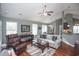 Open living room with hardwood floors, neutral walls, and ample natural light at 265 Encore Circle, Myrtle Beach, SC 29579