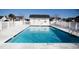 Community pool with surrounding fence and restrooms at 265 Encore Circle, Myrtle Beach, SC 29579