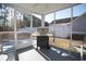 Relaxing screened porch with ceiling fan and grill at 265 Encore Circle, Myrtle Beach, SC 29579