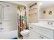 Well-maintained bathroom featuring shower-tub combo with a palm-tree themed shower curtain at 2701 S Ocean Blvd. # 1711, North Myrtle Beach, SC 29582