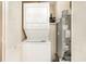 This laundry closet shows a stacked washer and dryer next to the HVAC unit at 2701 S Ocean Blvd. # 1711, North Myrtle Beach, SC 29582