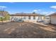 Back of house with patio, yard, and detached garage at 304 Sanders Ct., Mullins, SC 29574