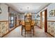 Formal dining room with chandelier and wood table set at 318 Flagstone Dr., Myrtle Beach, SC 29588