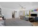 Main bedroom with king-size bed, en-suite bathroom, and access to patio at 3348 Merganser Dr., Conway, SC 29527