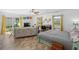 Main bedroom with large bed, access to backyard, and plenty of natural light at 3348 Merganser Dr., Conway, SC 29527