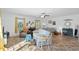 Spacious main bedroom with large bed, sitting area, and access to the backyard at 3348 Merganser Dr., Conway, SC 29527