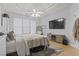 Primary bedroom with a king-size bed and built-in fireplace at 394 Blackberry Ln., Myrtle Beach, SC 29579