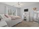 Relaxing bedroom with a vanity, comfortable bed, and large window at 394 Blackberry Ln., Myrtle Beach, SC 29579