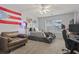 Spacious bedroom with a bed, desk setup, and ample floor space at 394 Blackberry Ln., Myrtle Beach, SC 29579