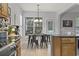 Eat-in kitchen with a breakfast nook, wood cabinets and granite countertops at 394 Blackberry Ln., Myrtle Beach, SC 29579