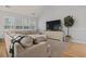 Relaxing living room with large sectional sofa and hardwood floors at 394 Blackberry Ln., Myrtle Beach, SC 29579