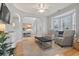 Comfortable living room featuring hardwood floors and ample natural light at 394 Blackberry Ln., Myrtle Beach, SC 29579