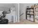 Functional home office with a stationary bike and built-in shelving at 394 Blackberry Ln., Myrtle Beach, SC 29579