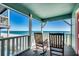 Relaxing oceanfront balcony with rocking chairs at 400 N Waccamaw Dr. # 304, Garden City Beach, SC 29576