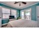 Ocean view bedroom with a queen bed and access to a private balcony at 400 N Waccamaw Dr. # 304, Garden City Beach, SC 29576