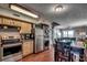 Modern kitchen with stainless steel appliances and ocean view at 400 N Waccamaw Dr. # 304, Garden City Beach, SC 29576