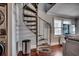 Spiral staircase leading to the upper level of the home at 400 N Waccamaw Dr. # 304, Garden City Beach, SC 29576