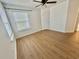 Bedroom with wood look flooring and a window letting in natural light at 4273 Santolina Way # E, Murrells Inlet, SC 29576