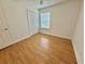 Standard bedroom featuring wood look flooring and window at 4273 Santolina Way # E, Murrells Inlet, SC 29576