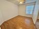 Bedroom featuring wood look flooring, ceiling fan, and natural light from window at 4273 Santolina Way # E, Murrells Inlet, SC 29576