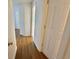 Hallway view features wood-look floors and neutral paint at 4273 Santolina Way # E, Murrells Inlet, SC 29576