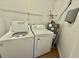 Laundry room featuring a full size washer, dryer, and water heater at 4273 Santolina Way # E, Murrells Inlet, SC 29576
