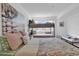 Bright bedroom features two beds including a bunk bed, wood floors, and white walls at 4560 Greenbriar Dr. # 102-B, Little River, SC 29566
