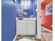 Powder room with white vanity and blue walls at 500 Fairway Village Dr. # 1-O, Myrtle Beach, SC 29588