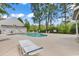 Community pool with lounge chairs and surrounding landscaping at 500 Fairway Village Dr. # 1-O, Myrtle Beach, SC 29588