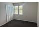 Small bedroom with a closet and window with blinds at 5001 Little River Rd. # W-402, Myrtle Beach, SC 29577