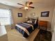 Bedroom with a double bed, ceiling fan, and window at 5126 Wesley Rd., Murrells Inlet, SC 29576