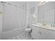 Clean bathroom with a tub shower combo, vanity, and white tile at 5750 Oyster Catcher Dr. # 1124, North Myrtle Beach, SC 29582