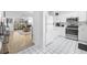 Modern kitchen with stainless steel appliances and white cabinets at 5750 Oyster Catcher Dr. # 1124, North Myrtle Beach, SC 29582