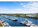 Aerial view of a marina with numerous boats and waterfront restaurants at 5750 Oyster Catcher Dr. # 1124, North Myrtle Beach, SC 29582
