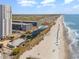 Aerial view of beachfront property with pool and ocean access at 5905 South Kings Hwy. # 908 C, Myrtle Beach, SC 29575